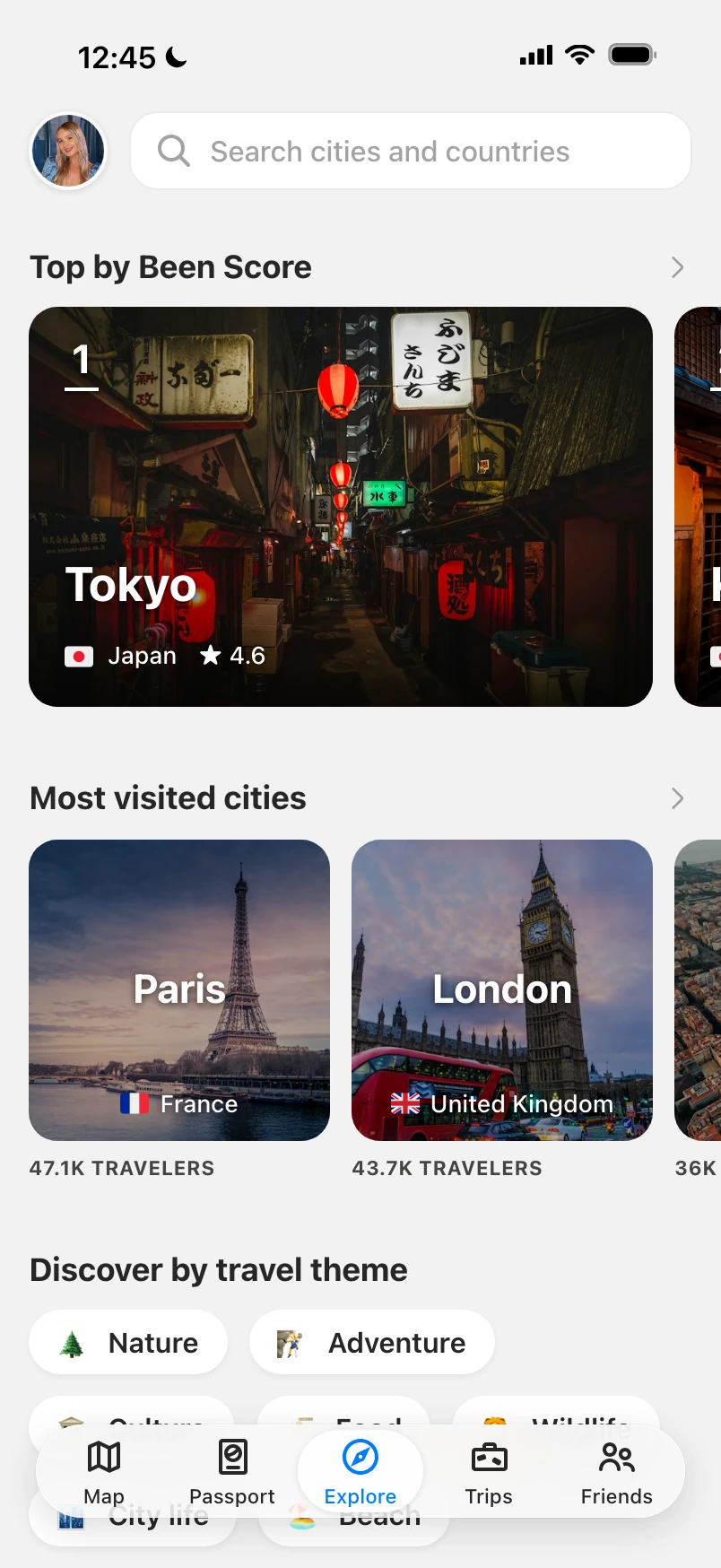 Explore tab with the top cities by Been Score, the most visited cities and travel theme chips