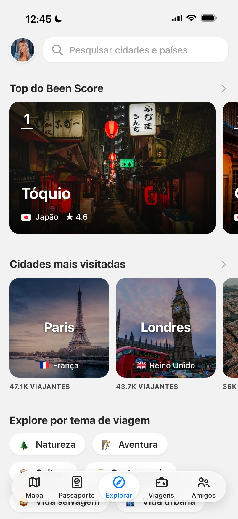 Aba Explorar com as melhores cidades por Been Score, as cidades mais visitadas e temas de viagem
